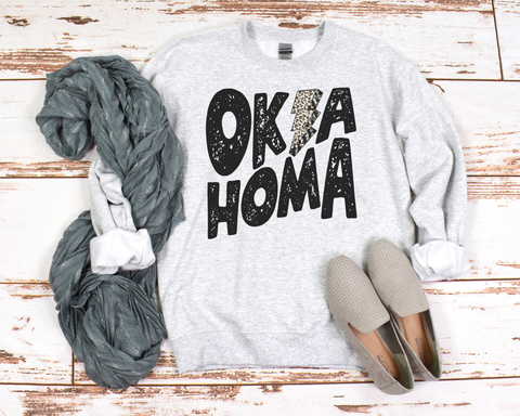 BLACK OKLAHOMA LEOPARD LIGHTENING BOLT SUB-TEE PARTY