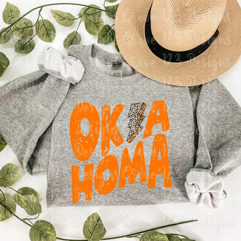 ORANGE OKLAHOMA LEOPARD LIGHTENING BOLT DTF-TEE PARTY