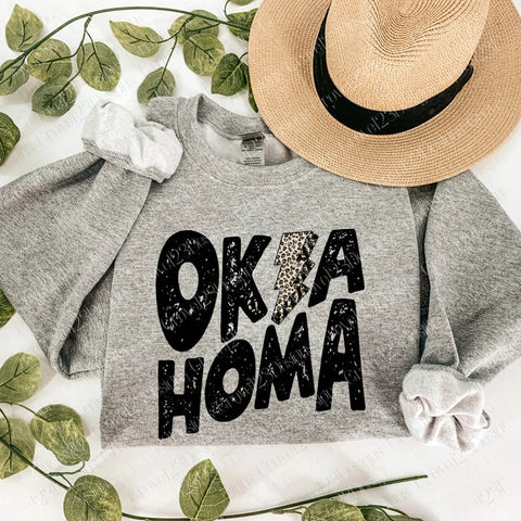 BLACK OKLAHOMA LEOPARD LIGHTENING BOLT DTF-TEE PARTY